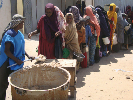 Families displaced by drought line up for food this week in Mogadishu, Somalia. 