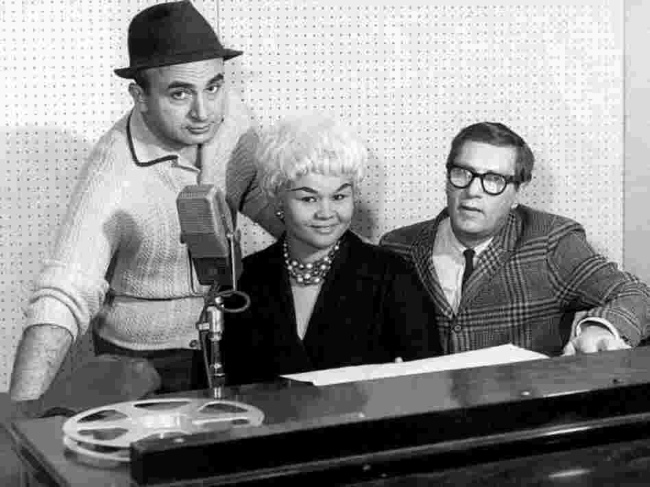 Etta James (center) poses with Phil Chess (left), founder of Chess Records, and producer Ralph Bass in 1960. 