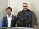 Bram van der Kolk, Finn Batato, Mathias Ortmann and Kim Schmitz, also known as Kim Dotcom, (from left to right) are remanded in custody in New Zealand on Friday. Bram van der Kolk, Finn Batato, Mathias Ortmann and Kim Schmitz, also known as Kim Dotcom, (from left to right) are remanded in custody in New Zealand on Friday.