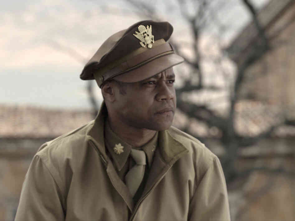 Cuba Gooding Jr. plays pipe-smoking, swaggering Maj. Emmanuel Stance in Red Tails. Cuba Gooding Jr. plays pipe-smoking, swaggering Maj. Emmanuel Stance in Red Tails.