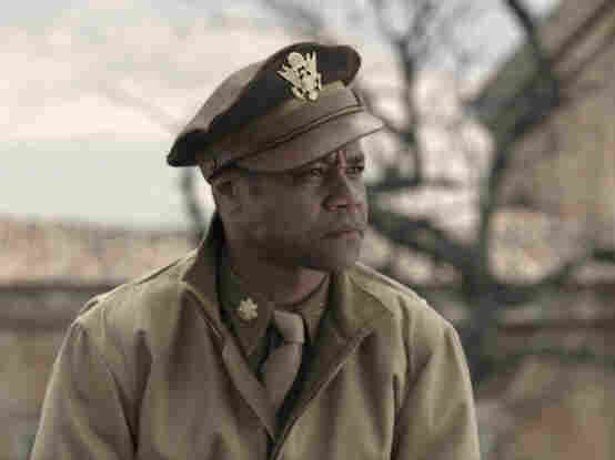 Cuba Gooding Jr. plays pipe-smoking, swaggering Maj. Emmanuel Stance in Red Tails. Cuba Gooding Jr. plays pipe-smoking, swaggering Maj. Emmanuel Stance in Red Tails.