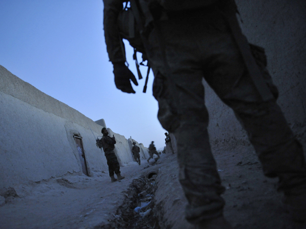 U.S. troops and Afghan National Army soldiers on a joint security patrol in Kandahar province last August. 