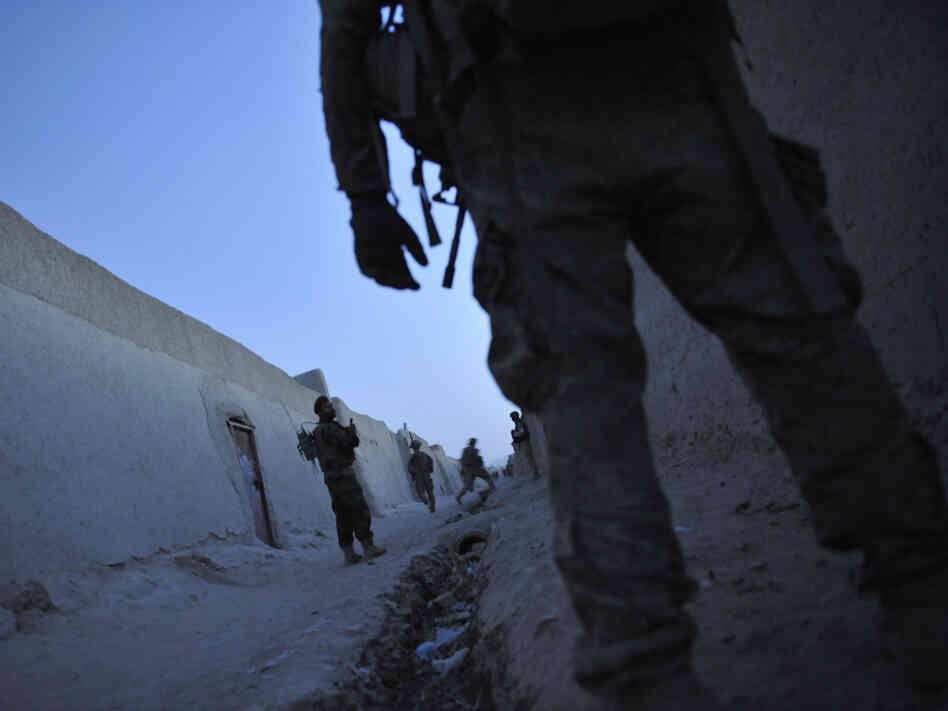U.S. troops and Afghan National Army soldiers on a joint security patrol in Kandahar province last August. 