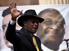 Former GOP presidential candidate Herman Cain waves at a rally the College of Charleston on January 20, 2012. Comedian Stephen Colbert held the event with Cain, titled "Rock Me Like a Herman Cain South Cain-olina Primary Rally", as part of his pseudo-run for president of "The United States of South Carolina." Former GOP presidential candidate Herman Cain waves at a rally the College of Charleston on January 20, 2012. Comedian Stephen Colbert held the event with Cain, titled "Rock Me Like a Herman Cain South Cain-olina Primary Rally", as part of his pseudo-run for president of "The United States of South Carolina."
