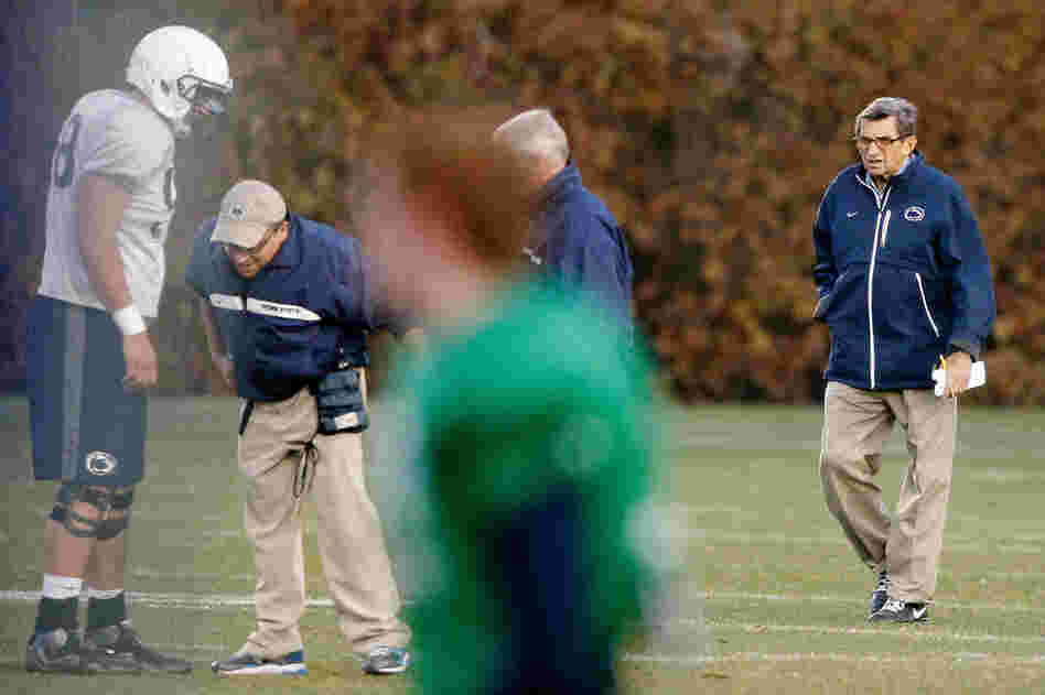 Usually attired in thick, smoky-lens glasses, rolled up khakis, jet-black sneakers and a blue windbreaker, Paterno was easy to spot on the sidelines. 