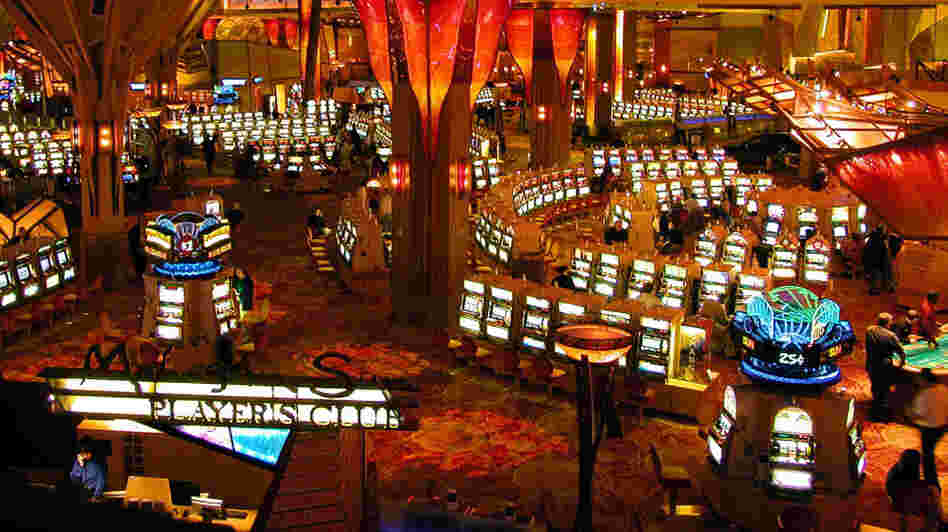 Gamblers play on some of the more than 6,000 slot machines at Mohegan Sun in Uncasville, Conn. The casino is owned and operated by the Mohegan Tribe. Gamblers play on some of the more than 6,000 slot machines at Mohegan Sun in Uncasville, Conn. The casino is owned and operated by the Mohegan Tribe.