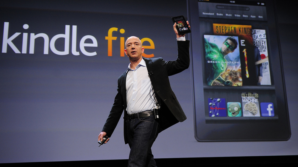 Amazon CEO Jeff Bezos introduces the new Kindle Fire tablet in New York, on September 28, 2011. The Fire's strong holiday sales were part of a trend that now has nearly a third of all American adults owning an e-book reader or tablet computer.