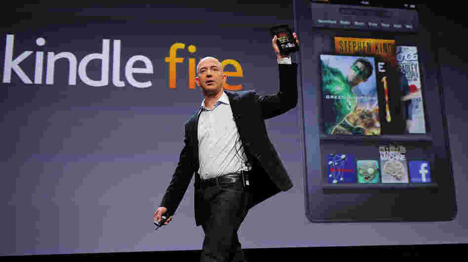 Amazon CEO Jeff Bezos introduces the new Kindle Fire tablet in New York, on September 28, 2011. The Fire's strong holiday sales were part of a trend that now has nearly a third of all American adults owning an e-book reader or tablet computer.