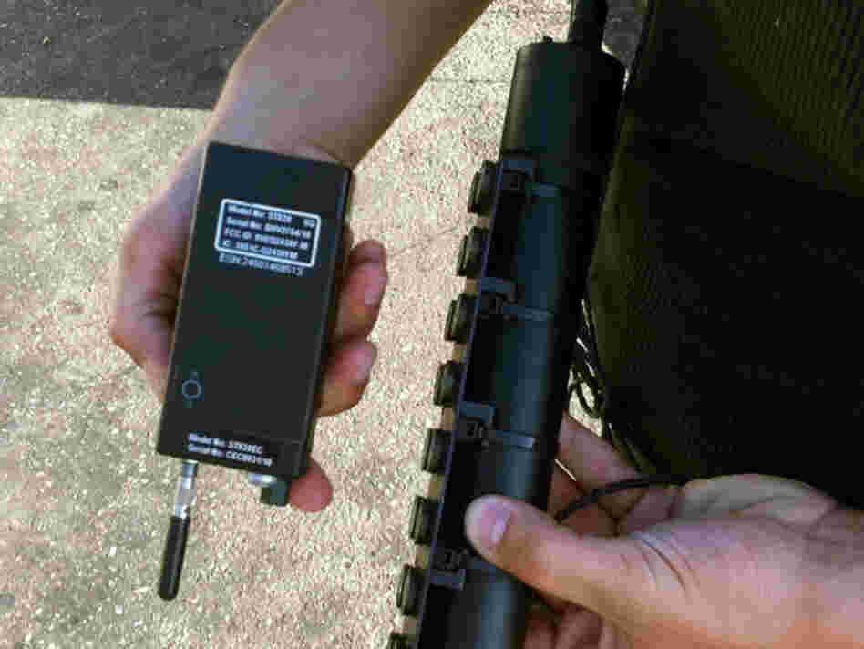 The Supreme Court heard arguments in a case about whether GPS monitoring devices like this one may be affixed to suspects' cars without a warrant from a judge. 