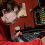 Sue Freeman, 78, checks her email at her home in Laguna Beach, Calif., on Saturday. She says her eyesight improved markedly since she received an experimental stem-cell procedure last July.