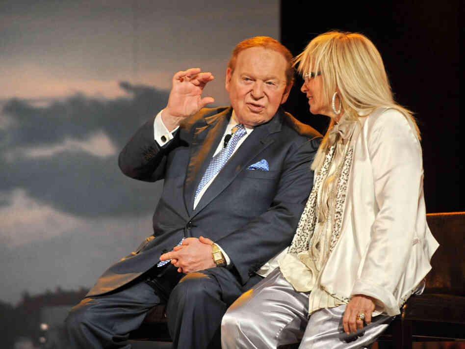 Casino owner Sheldon Adelson and his wife, Miriam, at the Marina Bay Sands complex in Singapore in June. The Adelsons have donated $5 million each to the pro-Gingrich superPAC Winning Our Future. 