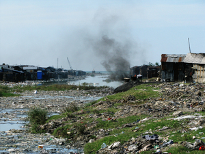 A garbage and sewage filled channel cuts through Cite Soleil, a slum in Port-au-Prince, Haiti. Poor sanitation and lack of access to clean drinking water are the main factors that contribute to the spread of cholera.