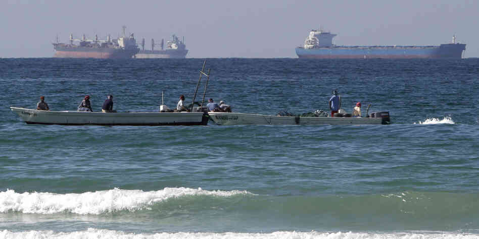 Fishing boats are seen in front of oil tankers on the Persian Gulf waters, south of the Strait of Hormuz. The European Union has announced plans to join U.S. efforts to slow the flow of oil from Iran, the world's third largest exporter. Fishing boats are seen in front of oil tankers on the Persian Gulf waters, south of the Strait of Hormuz. The European Union has announced plans to join U.S. efforts to slow the flow of oil from Iran, the world's third largest exporter.