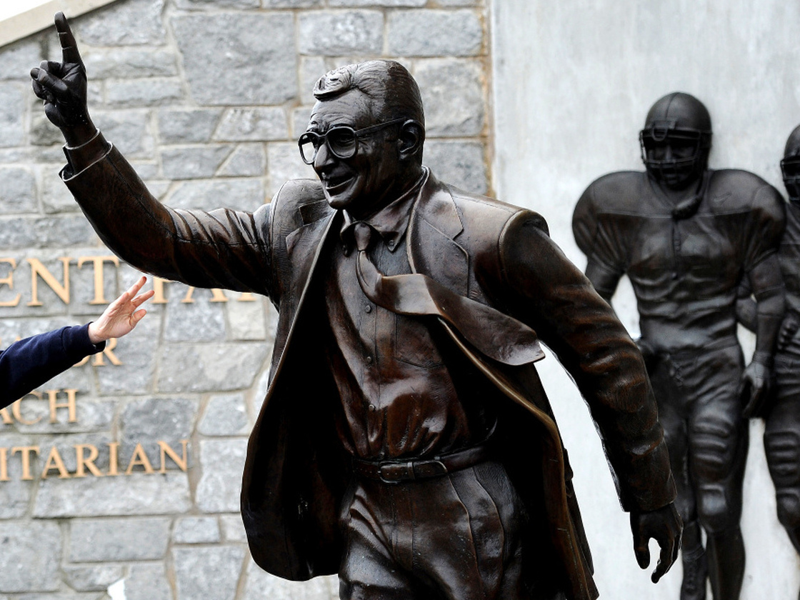 After former Penn State coach Joe Paterno's death was announced Sunday, fans paid their respects at a Paterno statue on campus. Paterno exerted a rare amount of control in his decades coaching football, says Frank Deford.