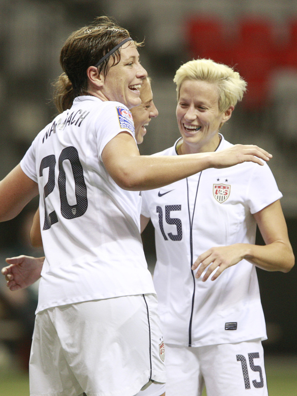 Abby Wambach and Megan Rapinoe celebrate an American goal against Guatemala during the 2012 CONCACAF Women's Olympic Qualifying Tournament. The Americans face Mexico Tuesday night.