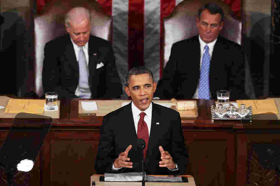 President Obama, flanked by Vice President Biden and Speaker of the House John Boehner, delivers his State of the Union speech Tuesday in Washington.