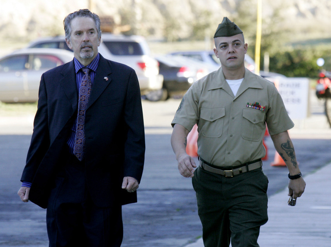 U.S. Marine Corps Staff Sgt. Frank Wuterich (R) walking into court with his defense attorney Neal Puckette for opening statements in the Haditha murders trial at Camp Pendleton on Jan. 9.