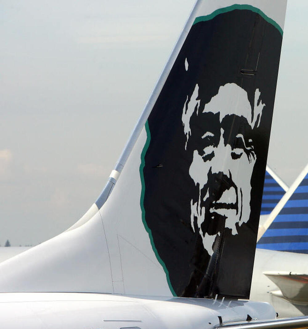 An Alaska Airlines jet. On that airline, prayer cards are no longer going to be part of the flying experience.