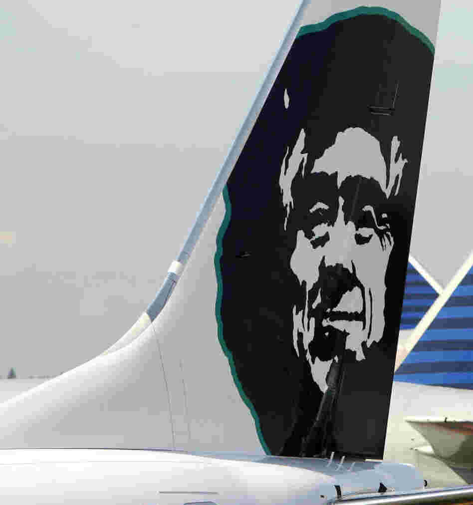 An Alaska Airlines jet. On that airline, prayer cards are no longer going to be part of the flying experience.