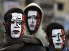 Egyptians wear face paint in the colors of the national flag in Tahrir Square as thousands gather to mark the one year anniversary of the uprising that ousted President Hosni Mubarak in Cairo. Egyptians wear face paint in the colors of the national flag in Tahrir Square as thousands gather to mark the one year anniversary of the uprising that ousted President Hosni Mubarak in Cairo.