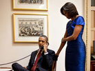 President Obama, with first lady Michelle Obama, speaks to the father of an American by Navy SEALs from Somali pirates on Tuesday. President Obama, with first lady Michelle Obama, speaks to the father of an American by Navy SEALs from Somali pirates on Tuesday.