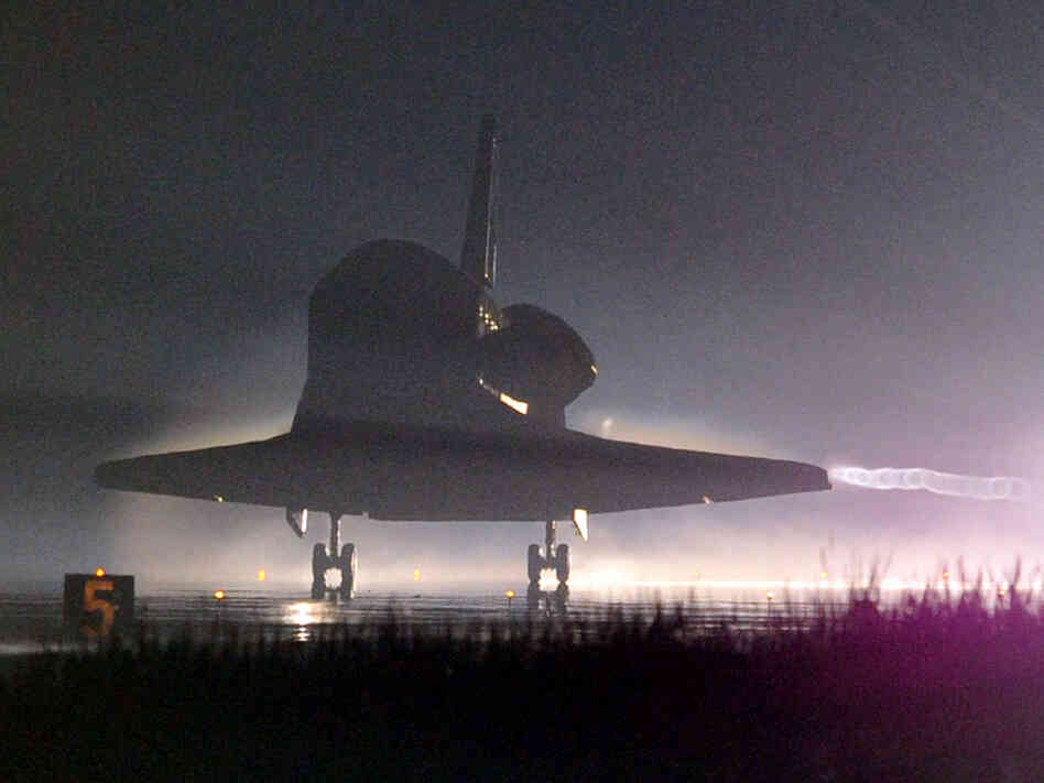 The space shuttle Atlantis lands in the pre-dawn hours on July 21, 2011 at Kennedy Space Center in Florida, ending its last mission to the International Space Station and bringing down the curtain on NASA's 30-year space shuttle program. The space shuttle Atlantis lands in the pre-dawn hours on July 21, 2011 at Kennedy Space Center in Florida, ending its last mission to the International Space Station and bringing down the curtain on NASA's 30-year space shuttle program.