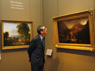 An exhibit at the Louvre Museum in Paris explores American landscape painting. Here, the museum's director, Henri Loyrette, looks at the oil paintings of Thomas Cole (1801-1848), known for his realistic and detailed works. An exhibit at the Louvre Museum in Paris explores American landscape painting. Here, the museum's director, Henri Loyrette, looks at the oil paintings of Thomas Cole (1801-1848), known for his realistic and detailed works.