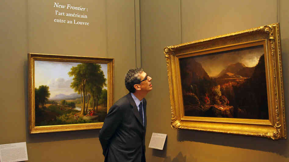 An exhibit at the Louvre Museum in Paris explores American landscape painting. Here, the museum's director, Henri Loyrette, looks at the oil paintings of Thomas Cole (1801-1848), known for his realistic and detailed works. An exhibit at the Louvre Museum in Paris explores American landscape painting. Here, the museum's director, Henri Loyrette, looks at the oil paintings of Thomas Cole (1801-1848), known for his realistic and detailed works.