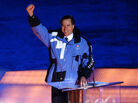 Mitt Romney, then the president of the 2002 Salt Lake Organizing Committee, greets attendees at the opening ceremony of the Winter Olympics in Utah. Mitt Romney, then the president of the 2002 Salt Lake Organizing Committee, greets attendees at the opening ceremony of the Winter Olympics in Utah.