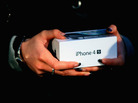 A new iPhone 4S at Apple's Beijing flagship store. A new iPhone 4S at Apple's Beijing flagship store.
