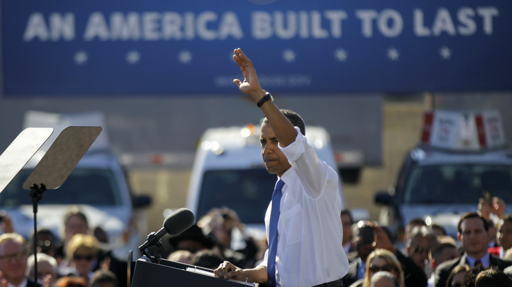 President Obama waves after speaking at a UPS facility in Las Vegas on Thursday. Nevada is one stop on the president's latest road trip focusing on the economy. 