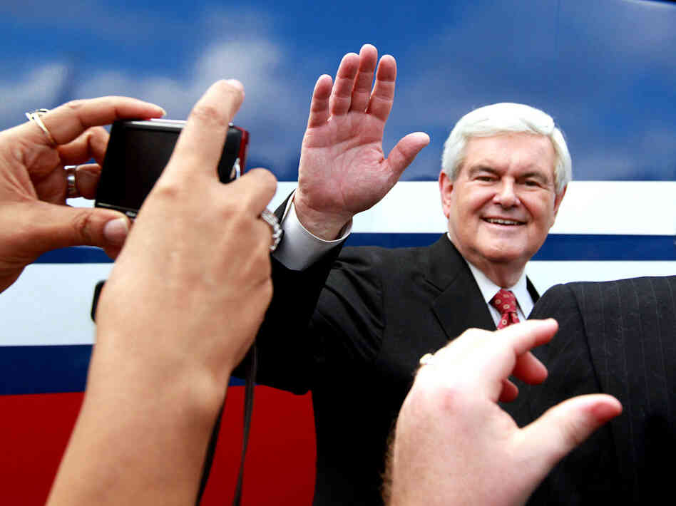Newt Gingrich greets supporters during a rally at Wings Plus in Coral Springs, Fla., on Jan. 25. The GOP candidates meet in Jacksonville Thursday night for a final debate before Tuesday's primary. 