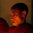 During a candlelight vigil in Dharamsala, India, on Wednesday, Tibetan Buddhist monks hold pictures of Tibetans they say were shot by Chinese security forces earlier this week. During a candlelight vigil in Dharamsala, India, on Wednesday, Tibetan Buddhist monks hold pictures of Tibetans they say were shot by Chinese security forces earlier this week.