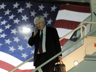 GOP presidential candidate Newt Gingrich speaks on a mobile phone as he arrives on a charter plane on Jan. 27 in Miami, Fla. GOP presidential candidate Newt Gingrich speaks on a mobile phone as he arrives on a charter plane on Jan. 27 in Miami, Fla.