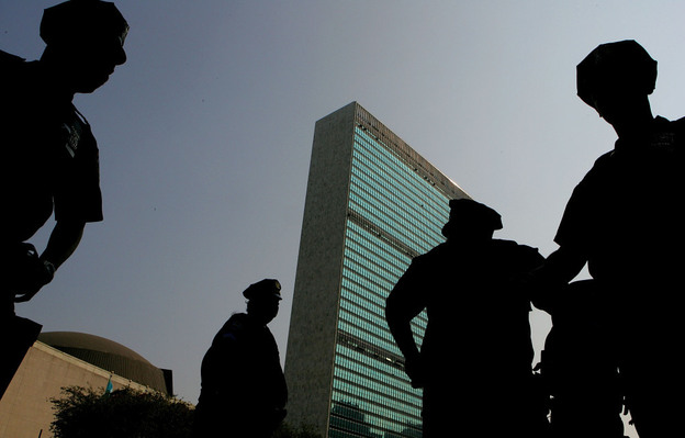 New York City Police officers stand guard in front of the United Nations buildings in 2005.