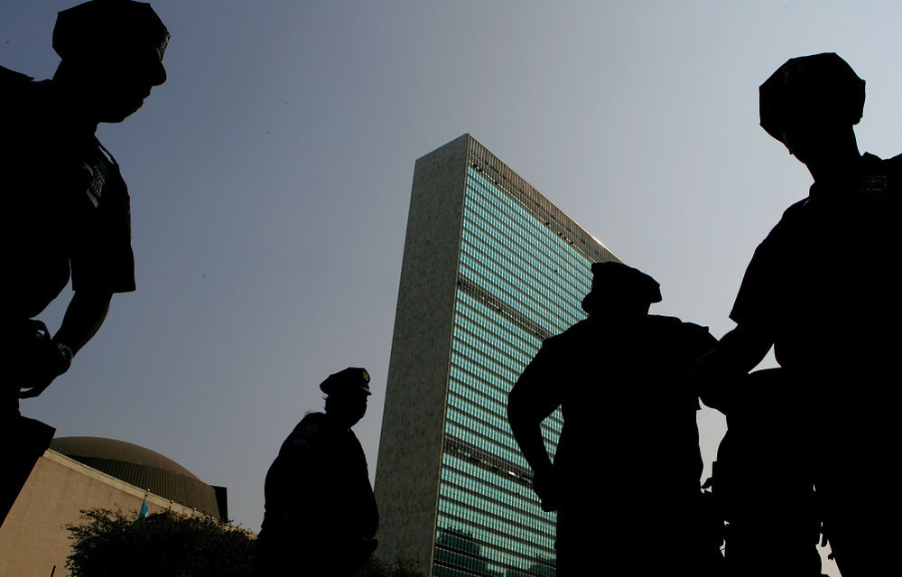 New York City Police officers stand guard in front of the United Nations buildings in 2005.