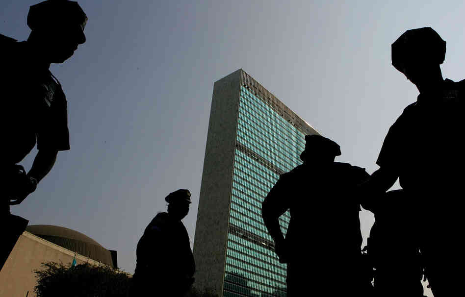 New York City Police officers stand guard in front of the United Nations buildings in 2005.
