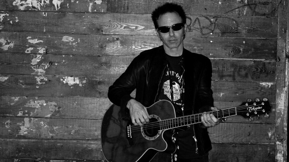 Nils Lofgren specializes in high-energy blues-rock.