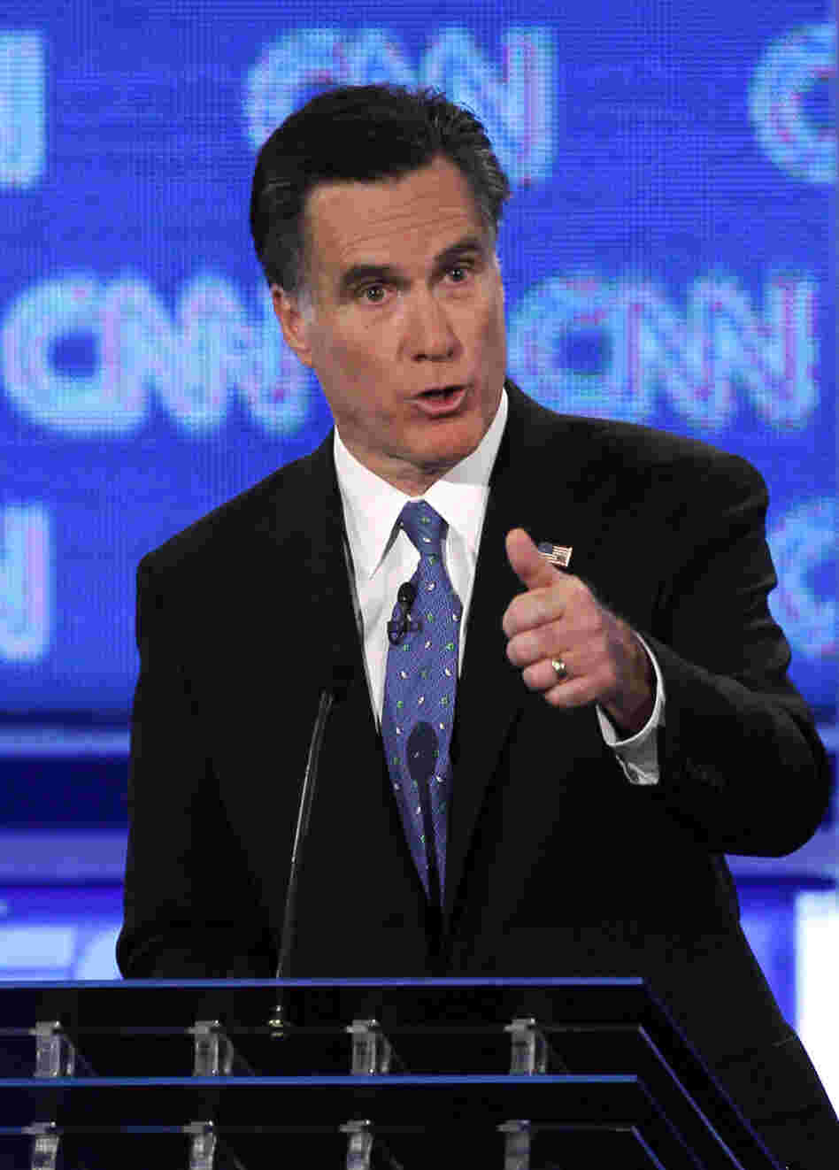 Former Massachusetts Gov. Mitt Romney offered a spirited defense of the individual mandate during Thursday night's GOP presidential candidate debate in Jacksonville, Fla. 