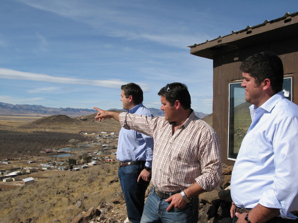 Alex, Daniel and Max LeBaron look out over Colonia LeBaron in Chihuahua, Mexico, in front of a shack they built as a lookout against approaching criminals. The murder of two citizens galvanized this community to protect itself, Alex says.