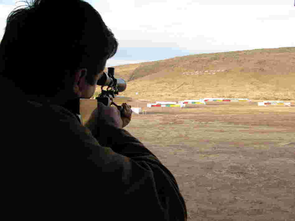 Alex LeBaron points his gun toward a target at a local shooting club. If Alex makes it into the federal Congress, his most passionate issue will be changing Mexico's gun laws.