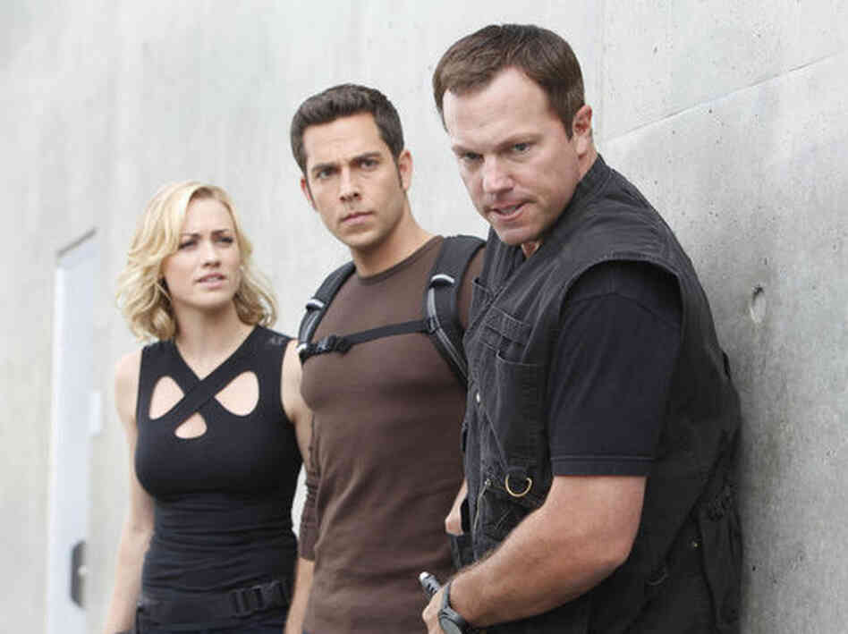 Yvonne Strahovski as Sarah Walker, Zachary Levi as Chuck Bartowski, and Adam Baldwin as John Casey in Chuck, which wraps tonight after five seasons. Yvonne Strahovski as Sarah Walker, Zachary Levi as Chuck Bartowski, and Adam Baldwin as John Casey in Chuck, which wraps tonight after five seasons.