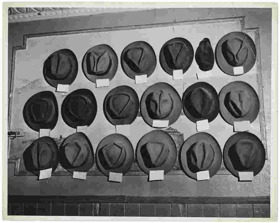 [Hats in a pool room, Mulberry Street, New York], circa 1943