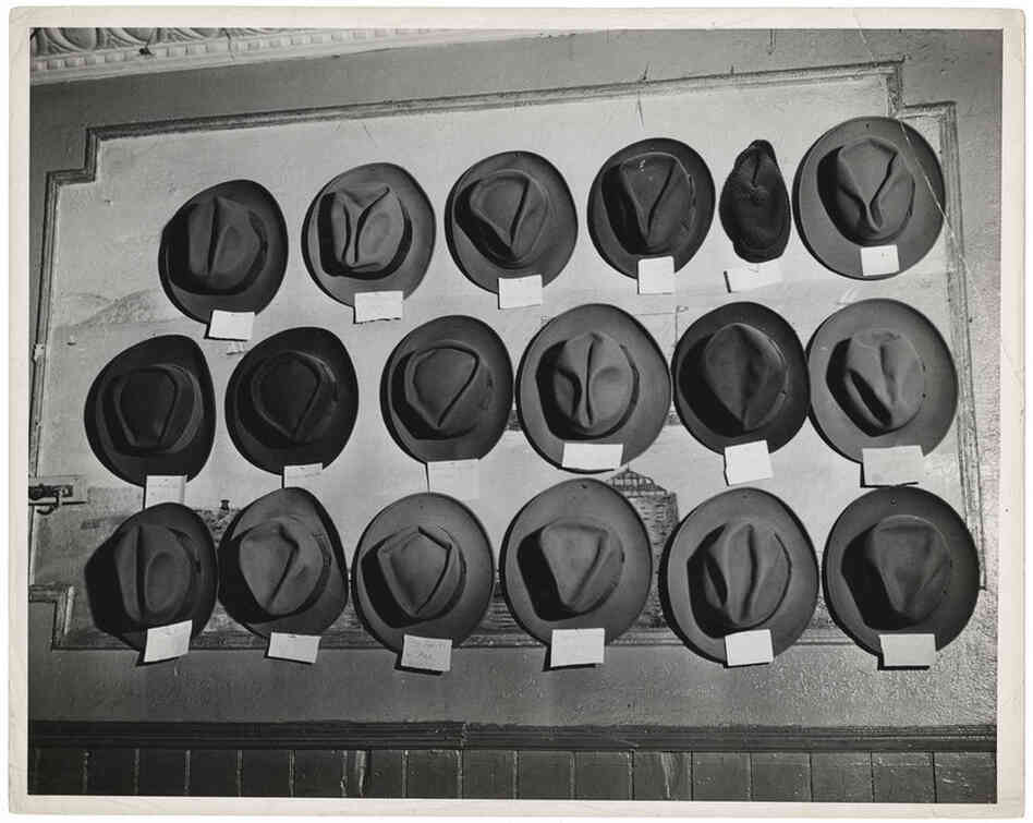 [Hats in a pool room, Mulberry Street, New York], circa 1943