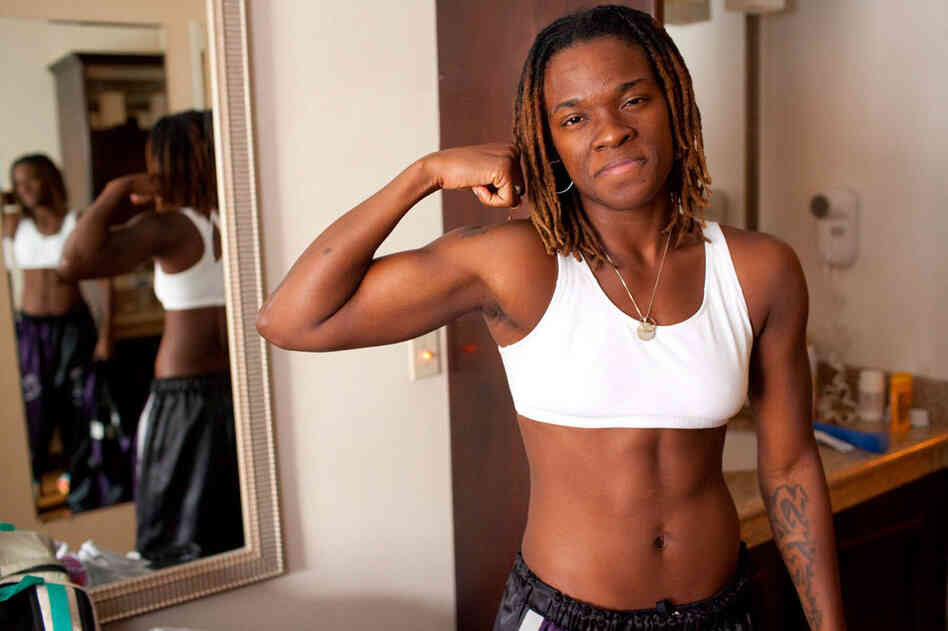 Tiara Brown says guys in the gym get jealous of her body. "I have abs of steel. And then I have these sexy, luscious lips. And then I've got these guns on my arms. I'm a boxer, and I'm a girl boxer."