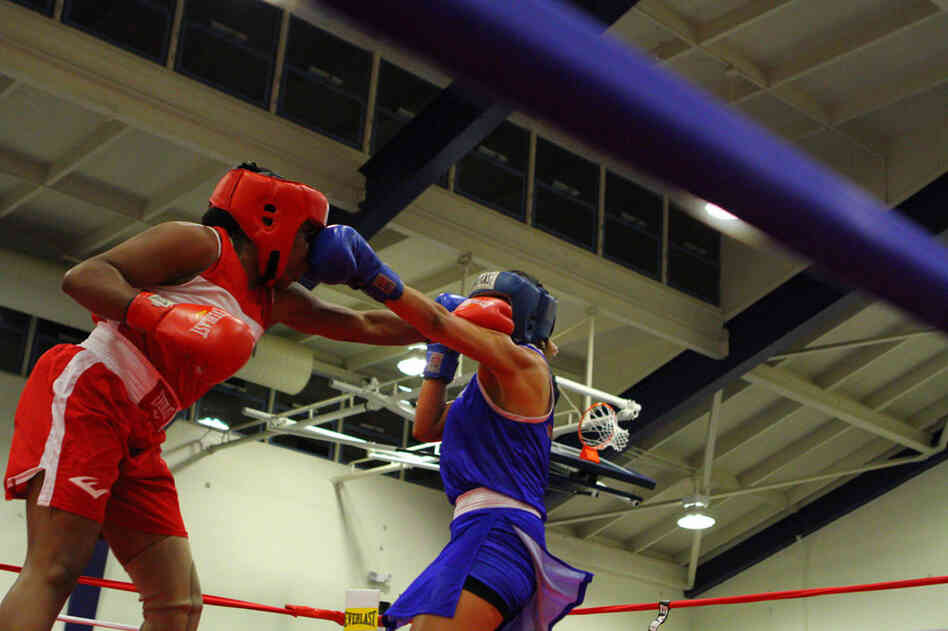 Franchon, in red, trades punches at the International Duel in Oxnard, Calif., in November 2011. "I'm a champion in life, so that's what gets me through."
