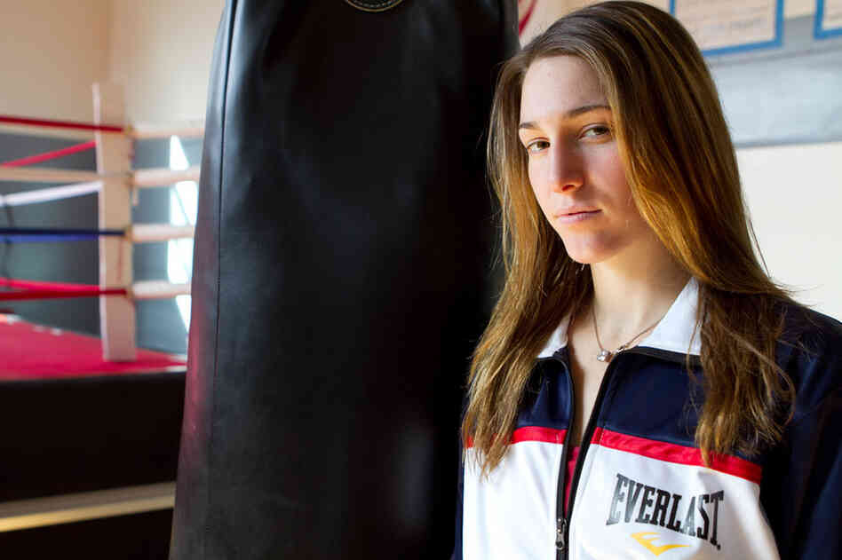 Mikaela Mayer is one of eight women competing for the lightweight title. "I like the fact that I'm feminine outside on the streets and I may not seem like a boxer, but really I am a boxer, and I have that side to me. I can be a woman and an aggressive athlete."