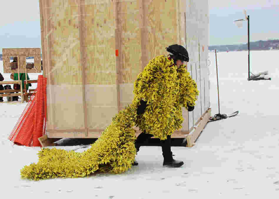 Most visitors to Art Shanty dress in the usual winter wear, but a few wear their own works of art, like a coat made of caution tape.