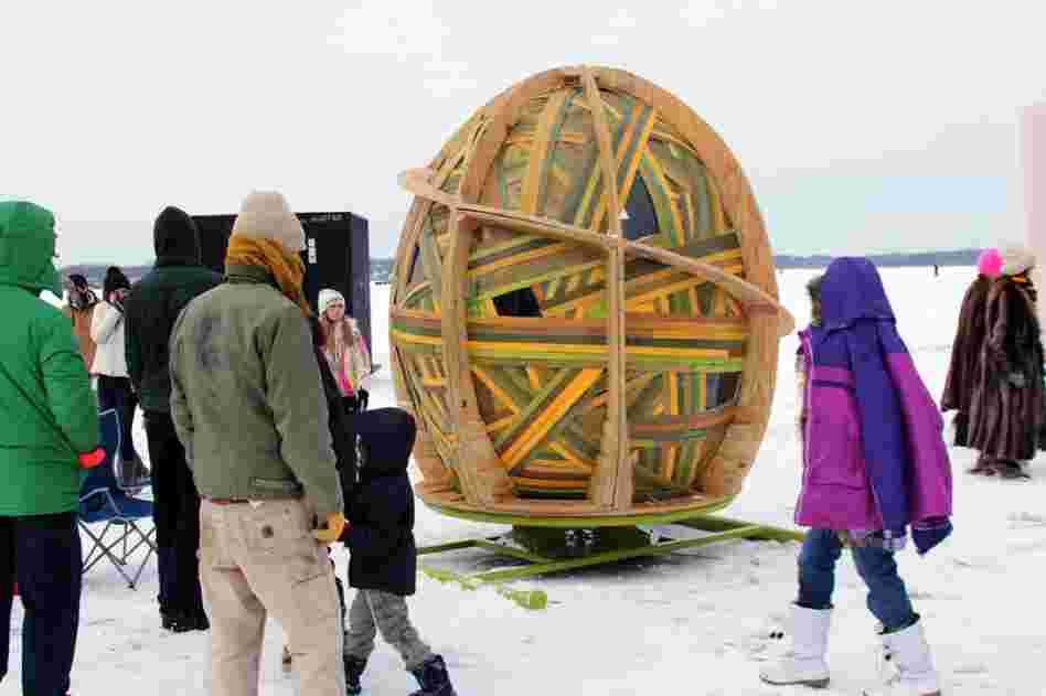 The big green egg of the SitandSpinShanty can whirl riders in a circle.