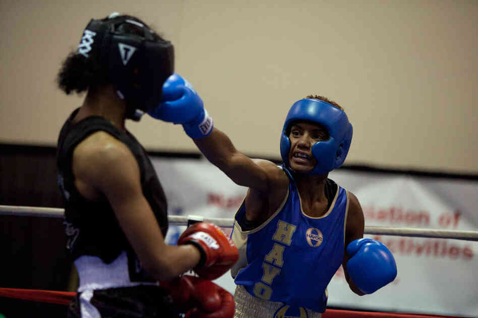 Bertha fights N'yteeyah Sherman at the Police Athletic League Tournament in October 2011. "You gotta think before you throw a punch. You can't be angry. When I'm in the ring, I'm thinking all the time, 'How can I beat this person and win?' I'm relaxed and I'm looking for my opponent's mistake. As soon as she makes a mistake, then I'll take advantage and get her."